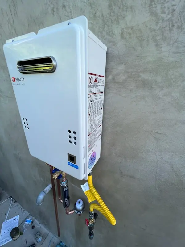 Tankless water heater installation for Frost Farms homes